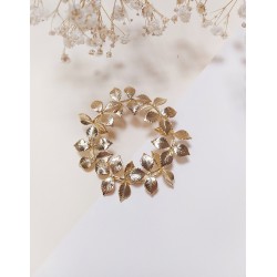 Broche César